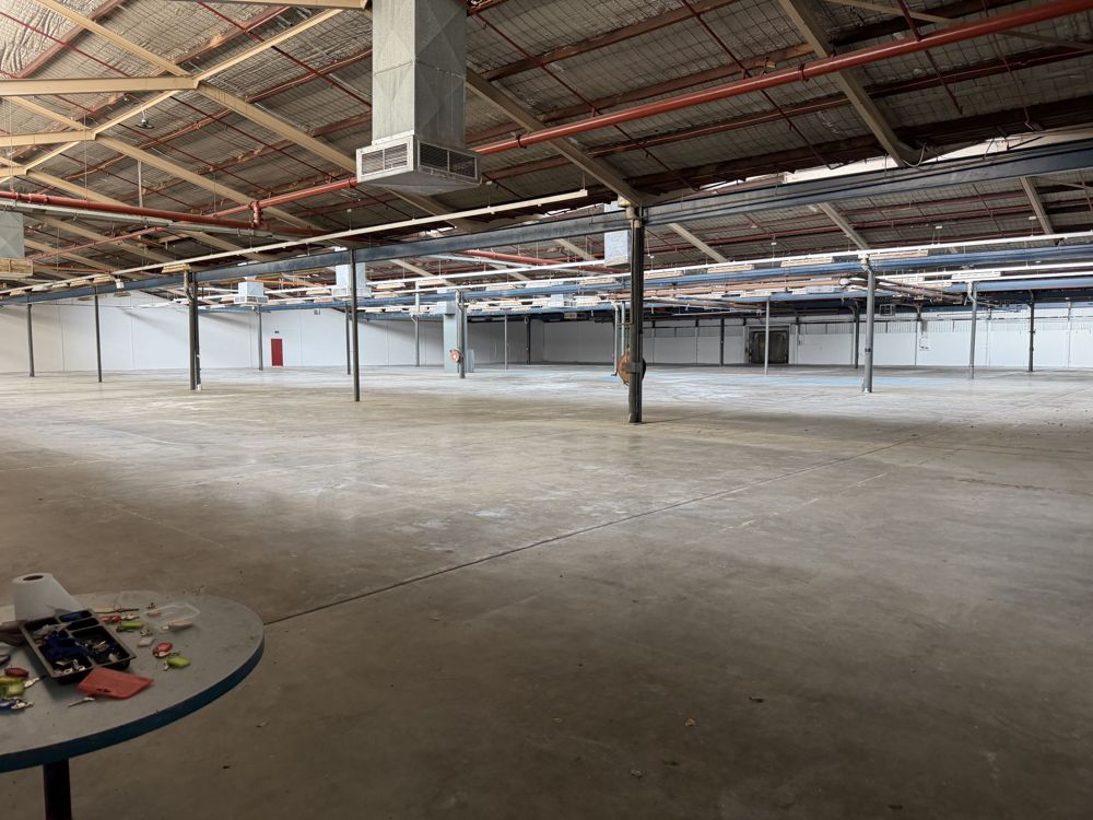 Empty warehouse interior at the Concord West film production site
