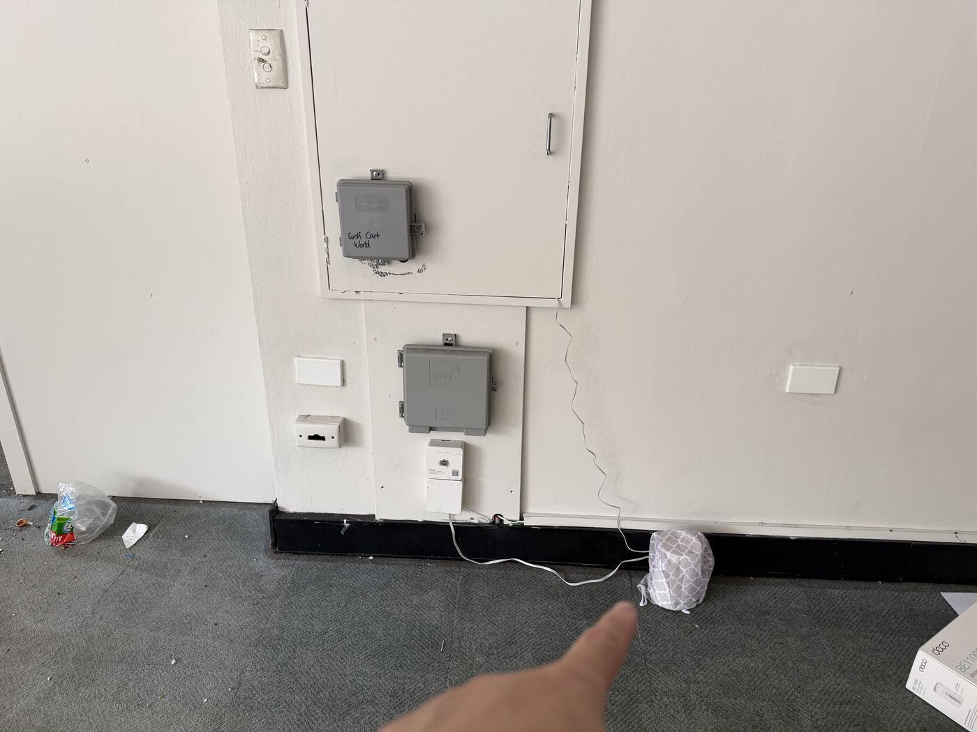 A node placed by the warehouse wall near an existing power point